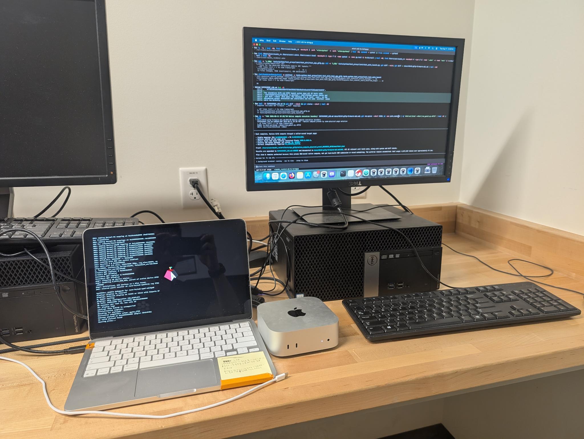 The Mac Mini host and MacBook Neo debug setup used for hypervisor development.