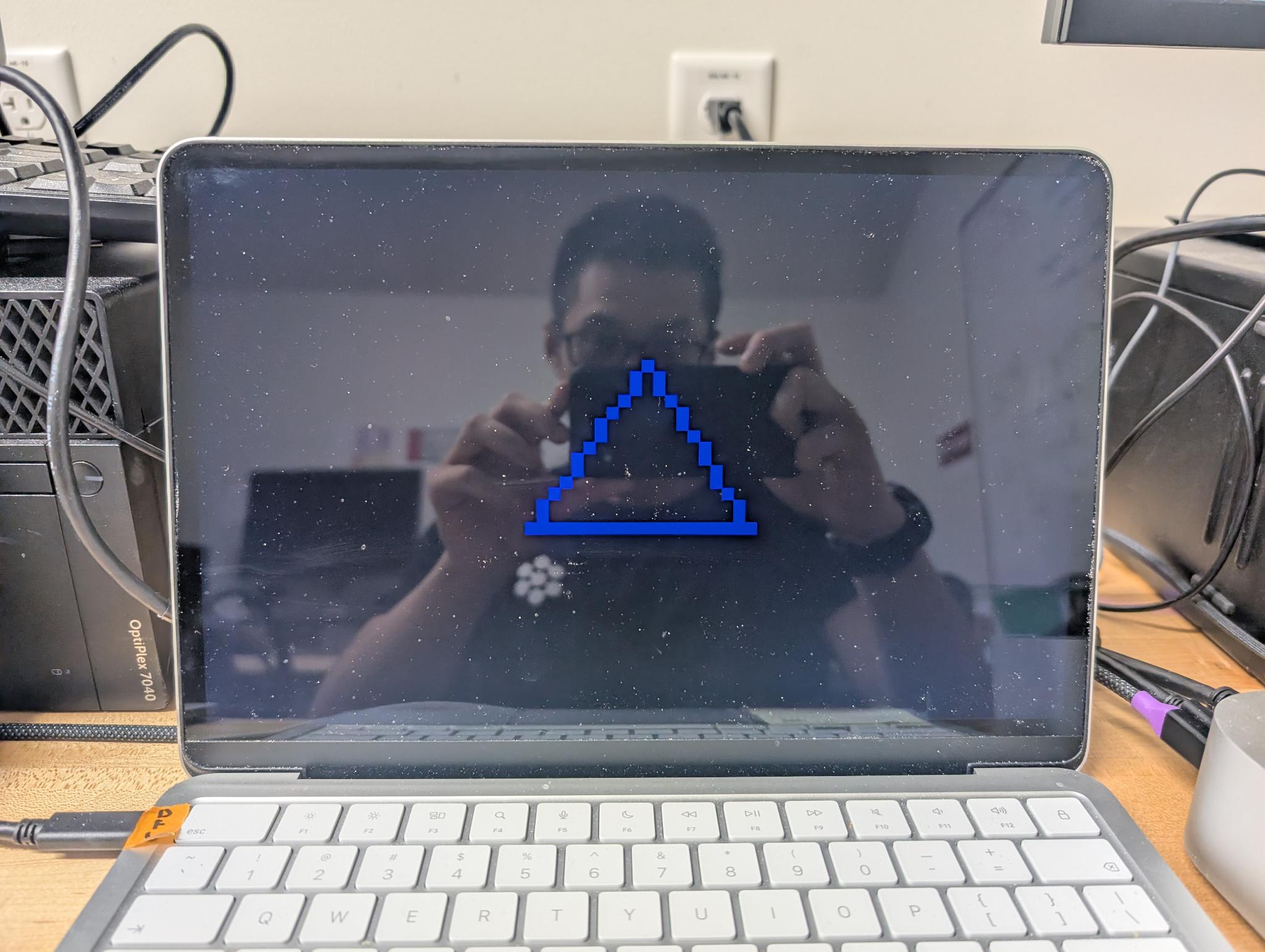 A triangle rendered by the clean-room reverse-engineered Apple GPU userspace and kernel driver.